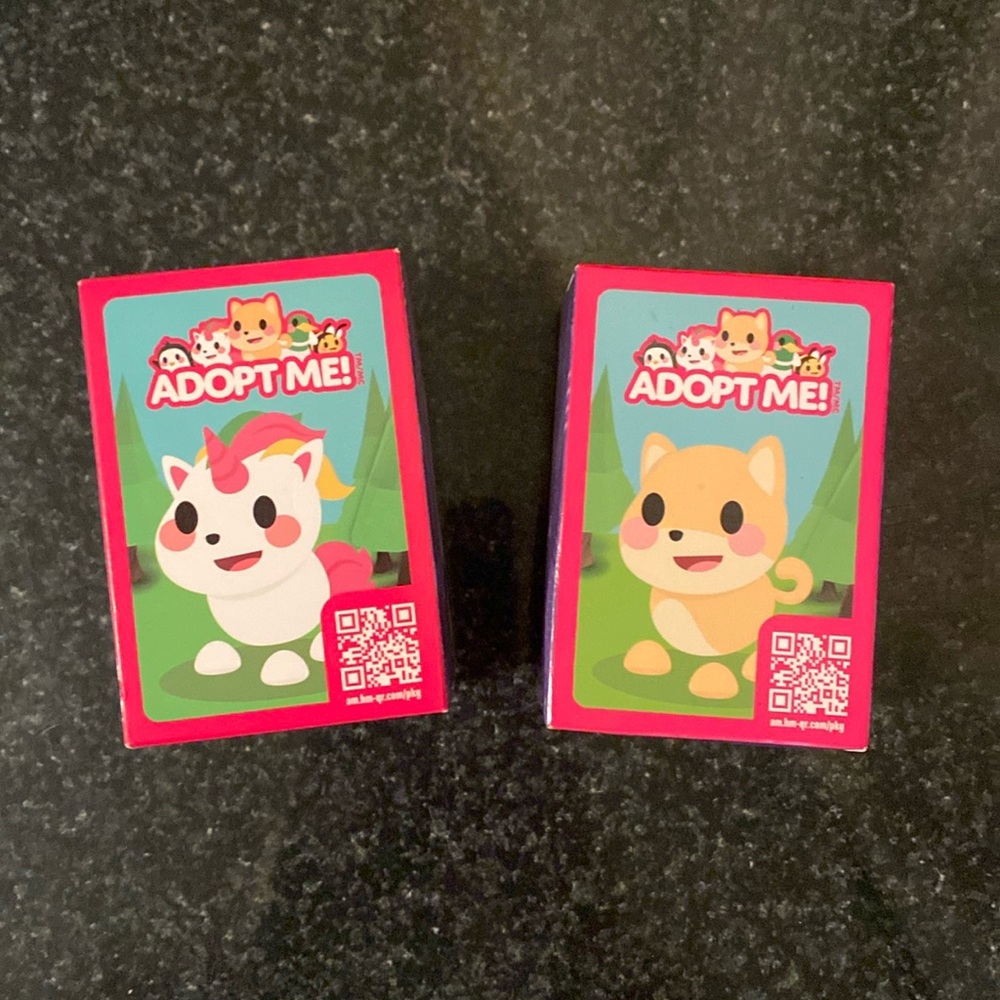 Two Adopt Me! McDonald's Happy Meal Toys